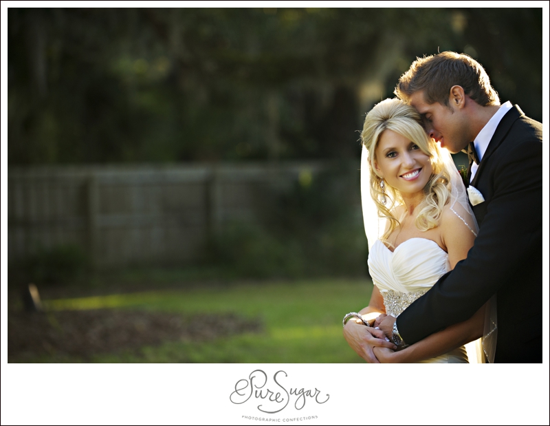 Beautiful Bride and Groom in red and black wedding at Palm Valley Gardens in Ponte Vedra