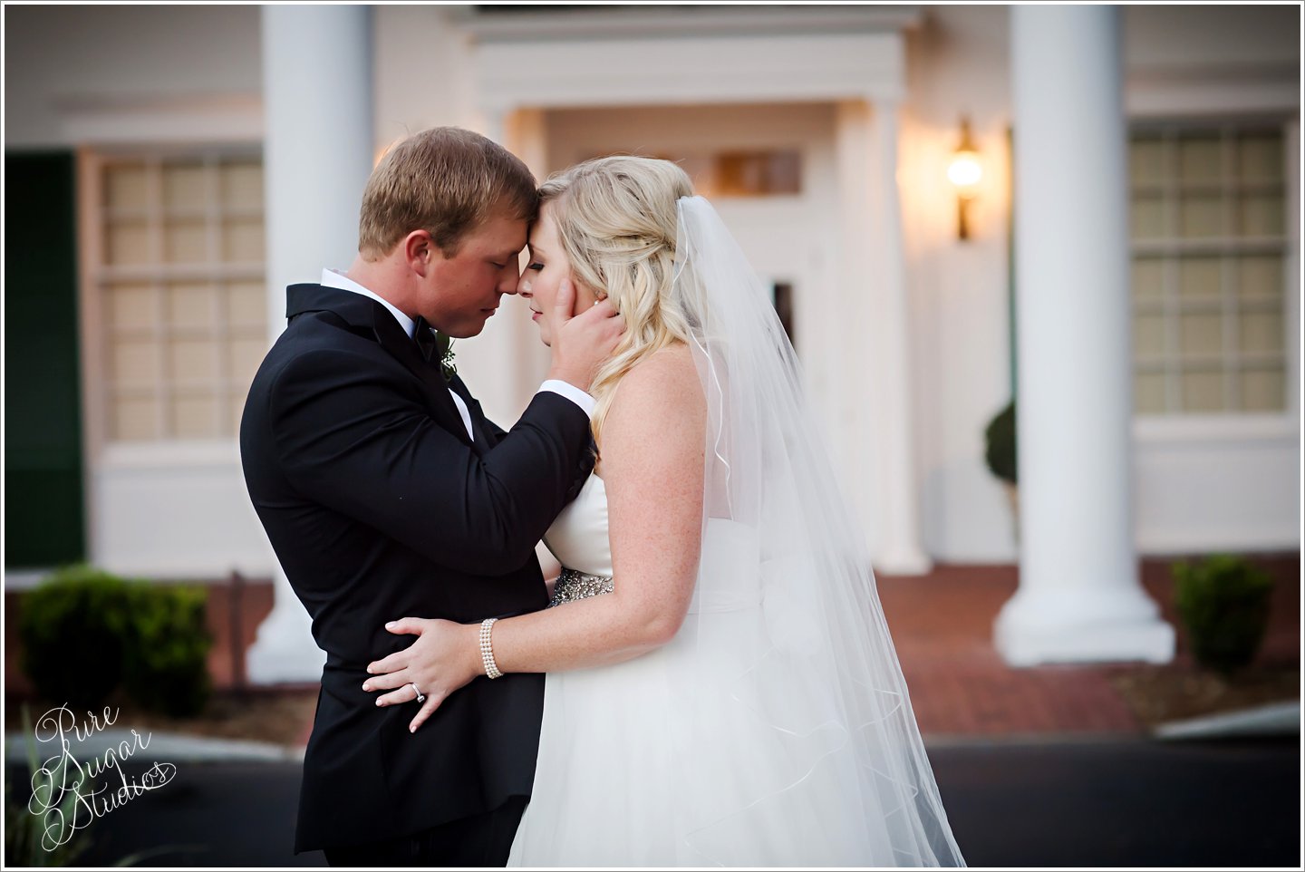 Bridal Portraits at Timuquana Country Club Wedding in front of white clubhouse