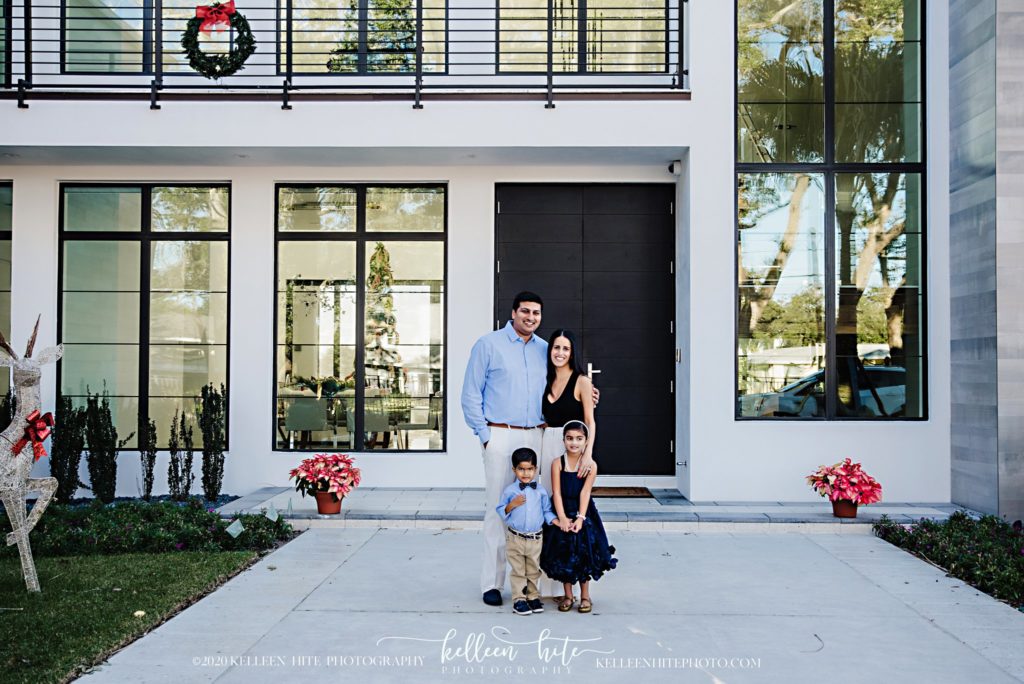 Photo of family in frnt of thier house