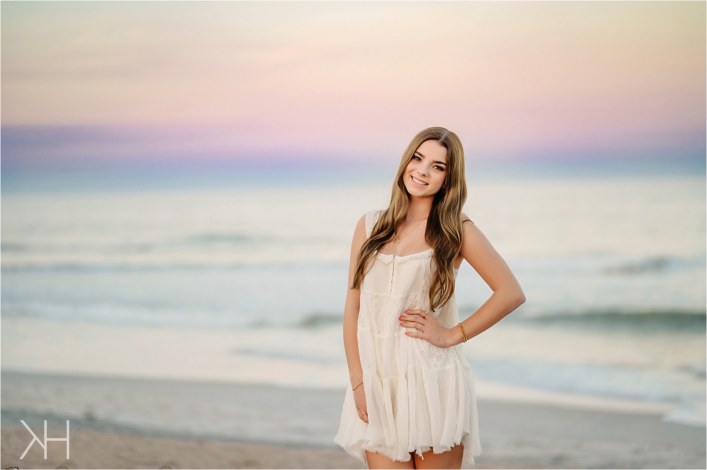 Senior portrait by the beach at sunset